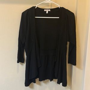 Delia’s black cardigan